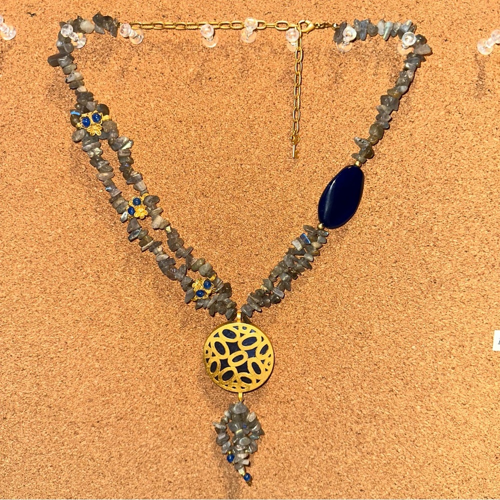 Statement necklace — gold tone with grey & blue stone
